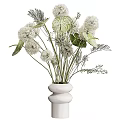 Elegant White Ceramic Vase With White Spherical Flowers Green Leaves And Delicate Foliage Arrangement