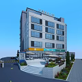 Modern Multi Story Office Building With Front Steps Greenery And Parking Area