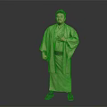 Man Wearing Green Kimono With Red Belt Standing With Hands On Chest Against Gray Background