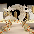 Elegant Wedding Banquet Hall With White Orange Floral Decor And Ornate Stage Design