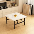 Folding Table With White Marble Top And Fruit Bowl In Kitchen Wooden Floor Area