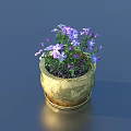 Blooming Bonsai Potted Plant With Small Purple Flowers And Golden Textured Pot