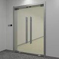 Modern Glass Double Doors With Metal Frame And Chrome Handles In Interior Space