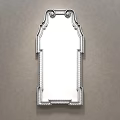 Arched Gold Frame Mirror Hanging on Gray Wall Reflecting Modern Room Interior
