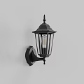 Black Classic Design Wall Lamp With Clear Glass Shade Mounted On White Wall