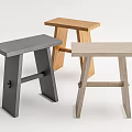 Three Various Colored Wooden Stools With Simple Modern Design And Square Seats