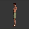 Man in green shorts and sandals with arms outstretched on gray background