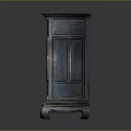 Traditional Dark Cabinet With Intricate Carved Motifs And Decorative Legs