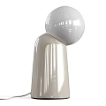 Elegant Contemporary Table Lamp Featuring Spherical Glass Shade And Sleek Transparent Base Design
