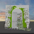 Casarte Display Area With Arched Door Green Plants And Silver Refrigerator Against Sky Sunset Background