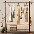 Wooden Clothes Racks With Various Clothes Hats Bags And Towels