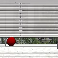 White Venetian Blinds with Red Ball and Green Trees Outside Window