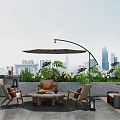Villa Balcony Outdoor Lounge Area With Cantilever Umbrella Coffee Table Green Plants And City Skyline View