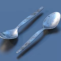 Silver Metal Spoon Set with Intricate Engraved Handles Shiny Polished Surface for Dining Table Use