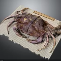 Whole Fresh Purple Crab on White Wrinkled Paper with Small Knife
