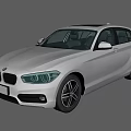 White BMW Hatchback Car With Sleek Exterior And Black Alloy Wheels