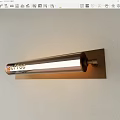 Modern Wall Sconce With Brass Base Clear Glass Tube Coffee Lettering Warm Light