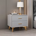 Modern Gray Bedside Table With Two Drawers Gold Handles And Table Lamp On Top