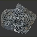 Pile of Irregularly Shaped Gray and Brown Crushed Stone Pieces on Dark Background