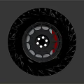 Black Off Road Tire With Deep Tread Pattern And Metal Rim Design