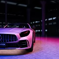Pink Mercedes AMG GT Sports Car In Modern Indoor Showroom With Purple Blue Lighting