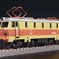 Yellow and Red Electric Train Model with EP10 PKP Markings on Railway Tracks