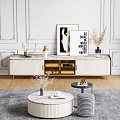 Modern White and Gold TV Stand with Wall Art and Decorative Items