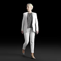 Woman in White Blazer and White Pants with Gray Patterned Top Standing on Black Background