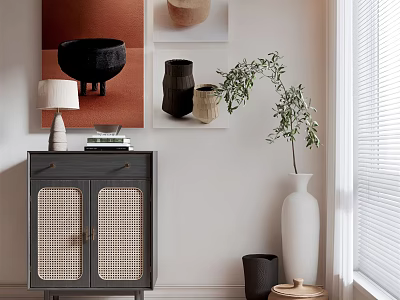 Gray Sideboard with Rattan Doors Table Lamp Books Green Plant and White Vase 3d model
