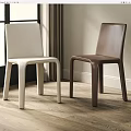 Modern White and Brown Dining Chairs in Room With Wooden Floor and Window Curtains