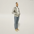 Woman in Gray Hooded Jacket White Scarf Blue Jeans and Beige Shoes in Light Backdrop