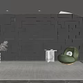 Black 3D Cube Wall Design With Embedded Lighting Green Armchair Marble Table White Plant