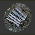 Stacked Wood Logs With Stone Base And Fallen Leaves In Natural Setting
