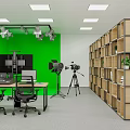Media Studio With Green Backdrop Wall Lights Camera Tripod Desk Office Chairs Bookshelf Plants