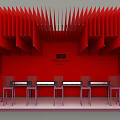 Red Themed Banquet Hall With Decorative Wall Panels Ceiling Design Long Tables And Chairs