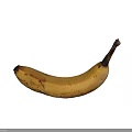 Ripe Banana With Brown Spots On Black Background Curved Shape