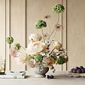 Gray Vase With White Peonies Green Flower Bouquet And Purple Plums On Wooden Table