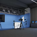 Professional Photography Studio Setup With Blue Backdrop Lighting Cameras And Monitors