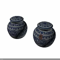 Set of Two Decorative Blue and White Ceramic Jars with Lids and Intricate Patterns