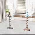 Black and Brown Side Tables with Decorative Items Near Window Natural Light