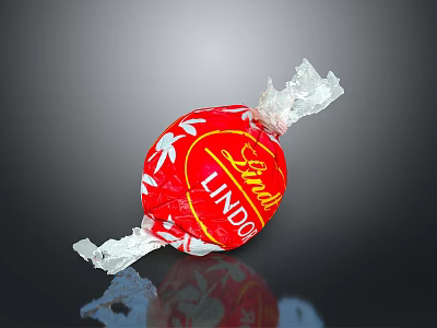 Lindt Lindo Red Candy With White Leaf Pattern On Crinkled Wrapper Against Black Background 3d model