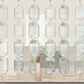 Modern Glass Room Divider With Oval Glass Panels And Brass Frame Interior Design