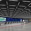 Monitoring Room Modern Interior With Large Data Display Screen Control Console Staff And Green Plants