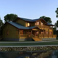 Two Story Wooden House With Blue Roof Balcony Lit Windows And Water View