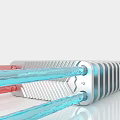Silver Heat Sink With Red And Blue Tubes And Finned Surface Design