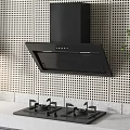 Kitchen Appliances Black Range Hood And Gas Stove On Perforated Wall With Light Countertop