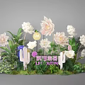 Floral Art Installation With Large White Pink Flowers Green Plants And Themed Signage