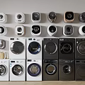 Assortment Of Wall Mounted And Freestanding Washing Machines In Various Designs And Colors