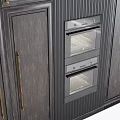 Dark Gray Wooden Kitchen Cabinets With Brass Handles And Built In Double Ovens