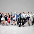Group of Diverse Business Professionals in Formal Attire Standing Together Studio Portrait